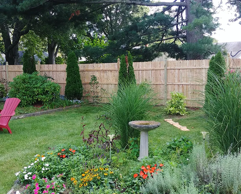 cedar fence flowers landscape